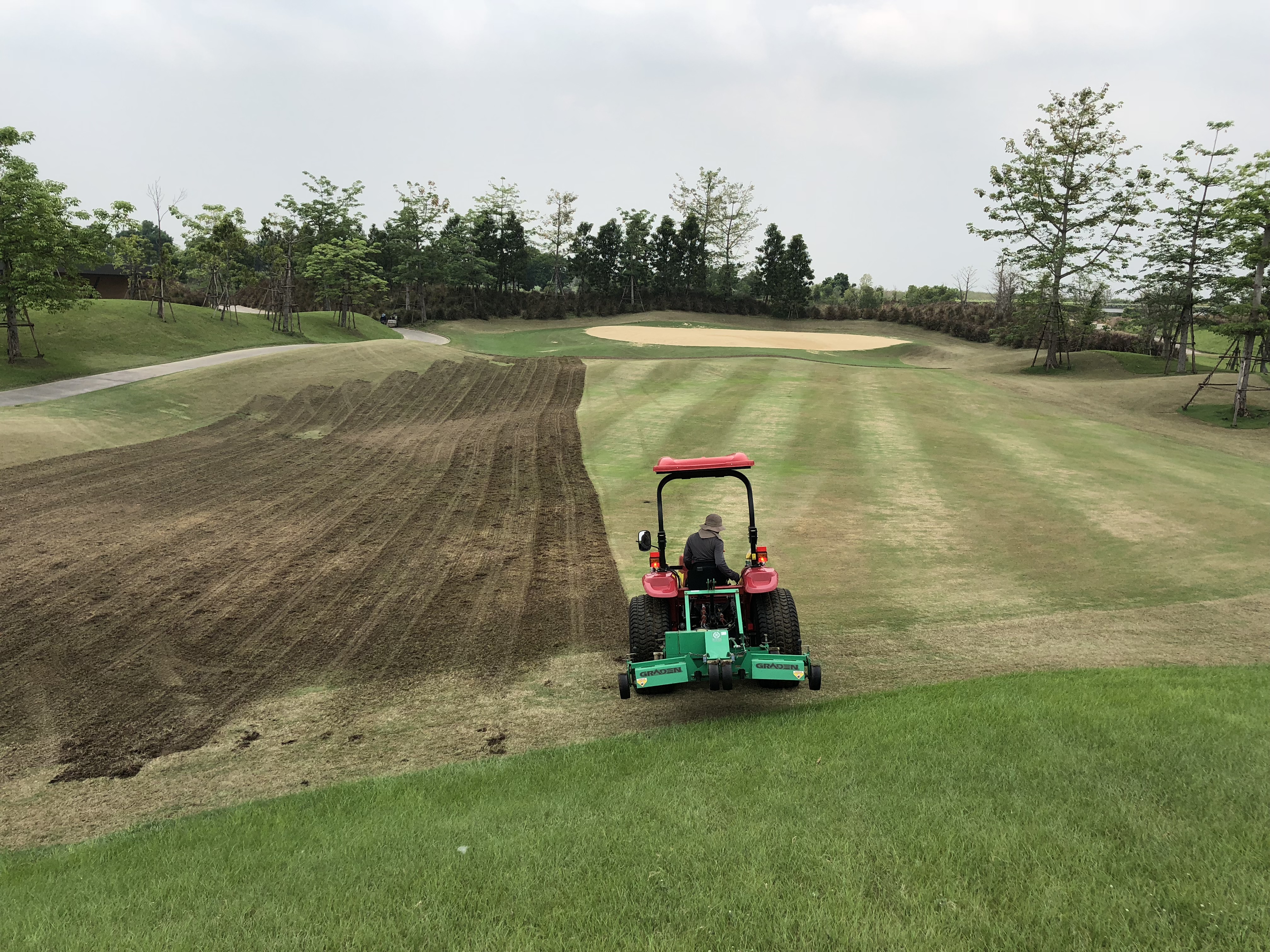 Graden scarifying the 15th fairway at Nikanti Golf Club, Thailand.