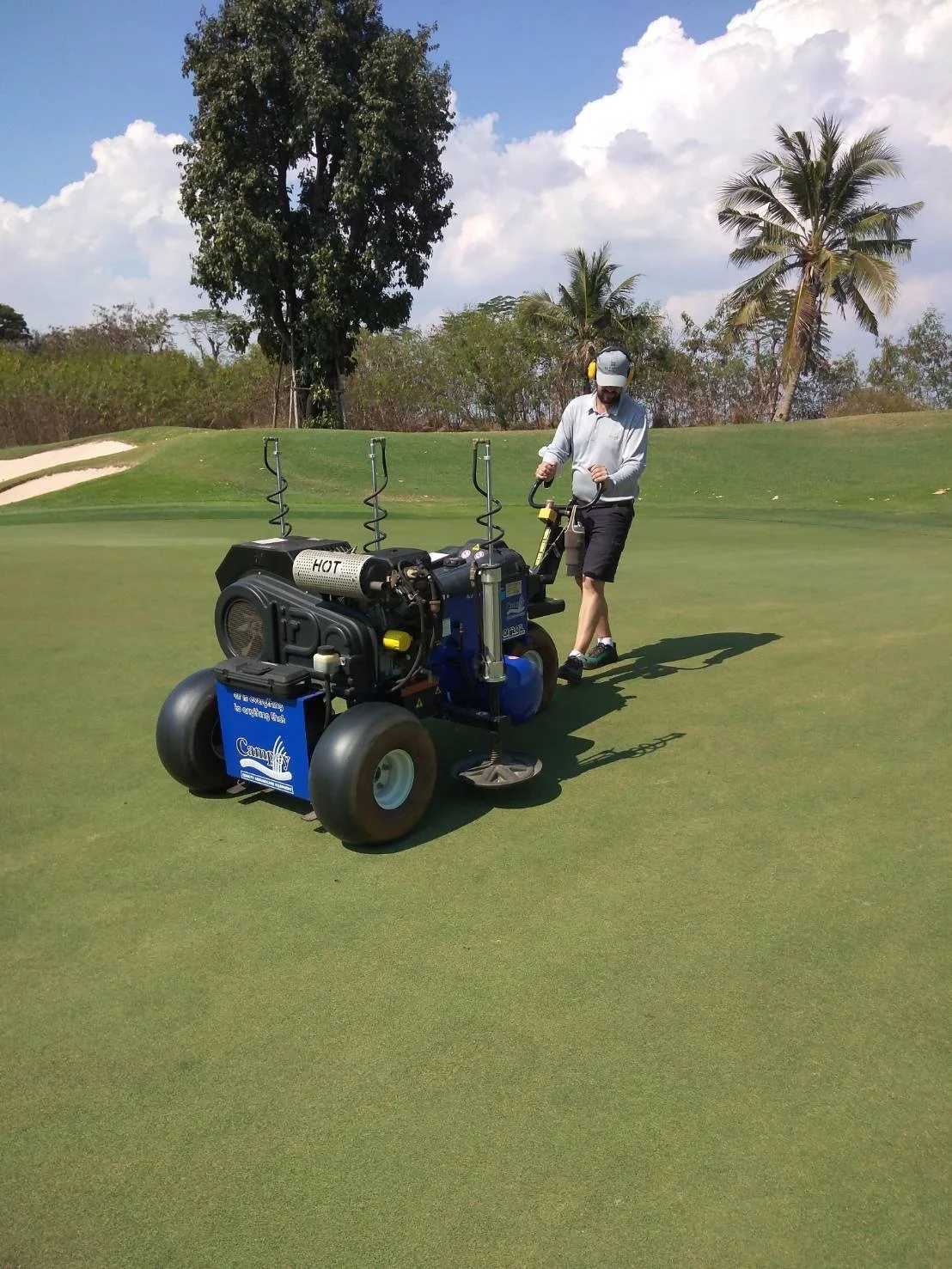 Richard Last operating an Air2G2 on the green at Nikanti Golf Club