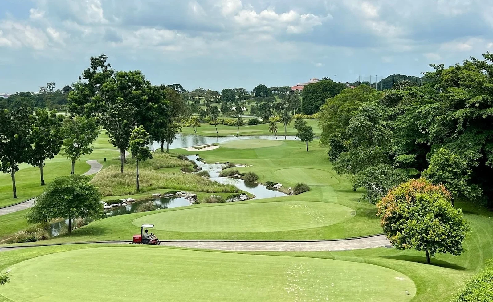 Looking down the Par 3 from tee to green on the Tanjong Course at Sentosa Golf Club