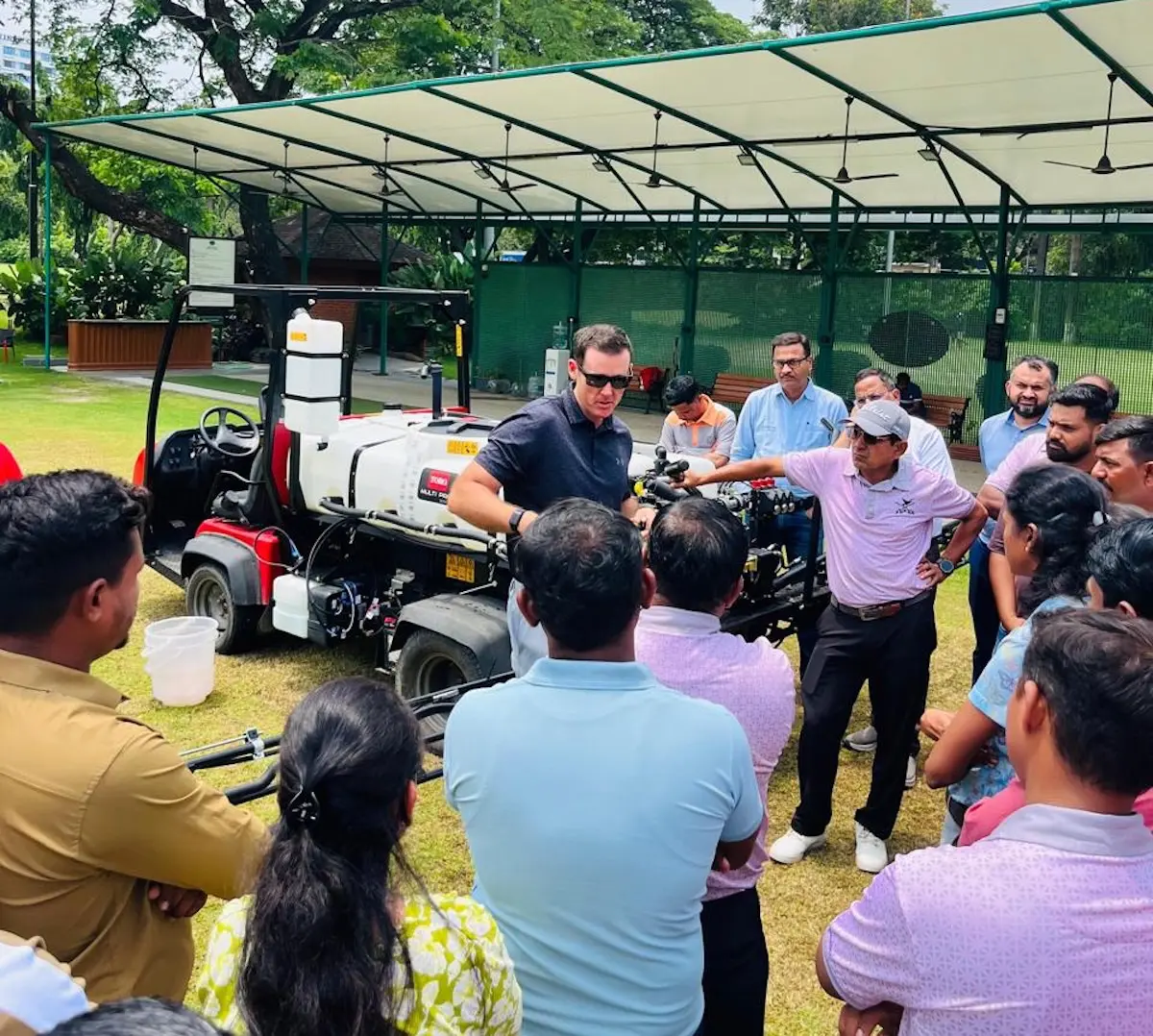BRT Agronomy training turf industry colleagues in India how to properly calibrate a sprayer and select the appropriate nozzle.
